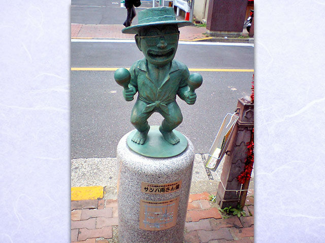 サンバ両さん像